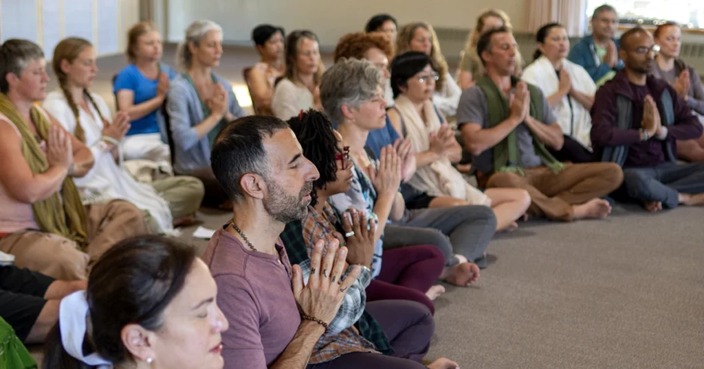 People sitting in a semicircle during Mount Madonna's New Year's Yoga Retreat