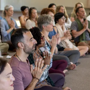 People sitting in a semicircle during Mount Madonna's New Year's Yoga Retreat