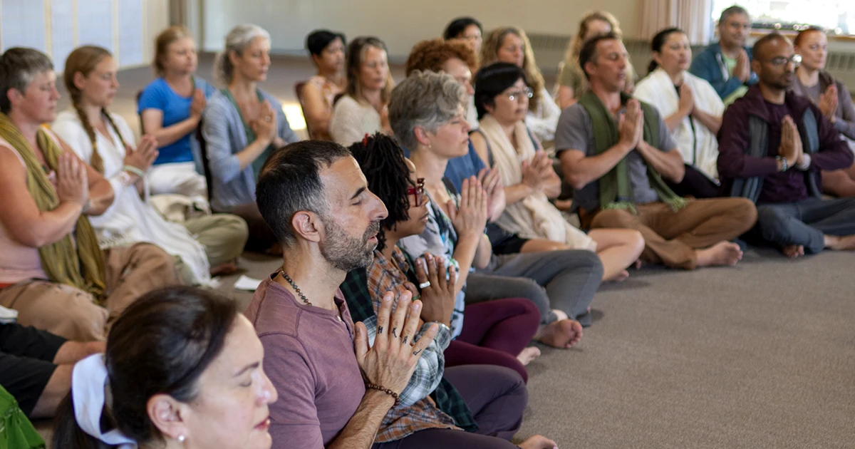People sitting in a semicircle during Mount Madonna's New Year's Yoga Retreat