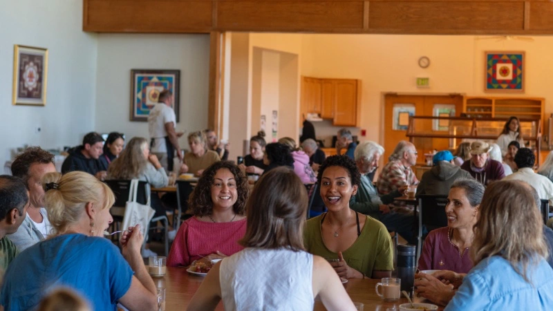 rotational volunteers eating together in community at Mount Madonna