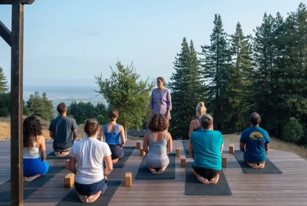 Panoramic view of Mount Madonna Center with Yoga Teacher Training YTT Program students practicing outdoors in the Santa Cruz Mountains.
