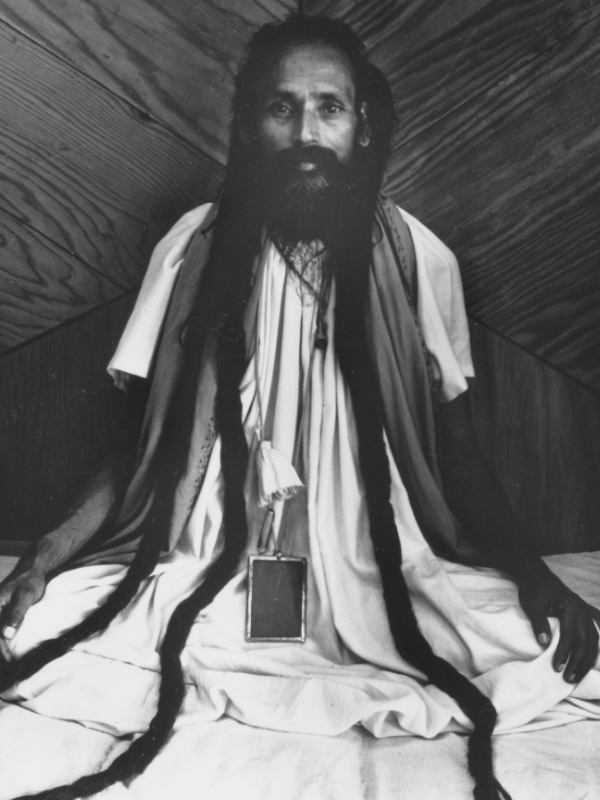 Babaji sitting with long hair