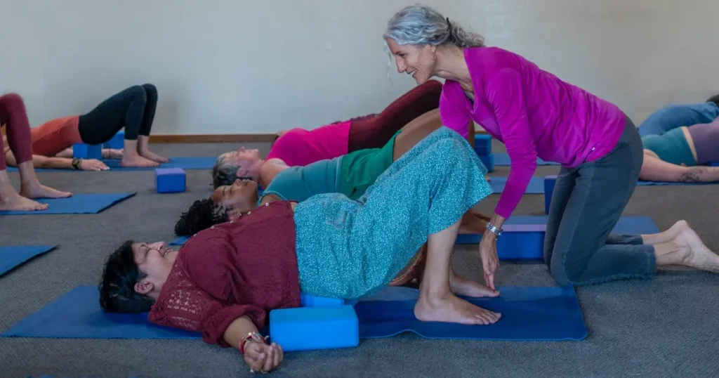 Laura Harris teaching a yoga class, image for her online yoga class