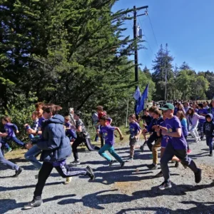 Kids running during the Summit for the Planet Walk-a-Thon