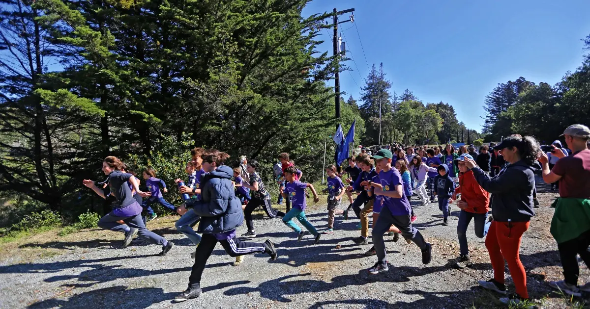 Kids running during the Summit for the Planet Walk-a-Thon