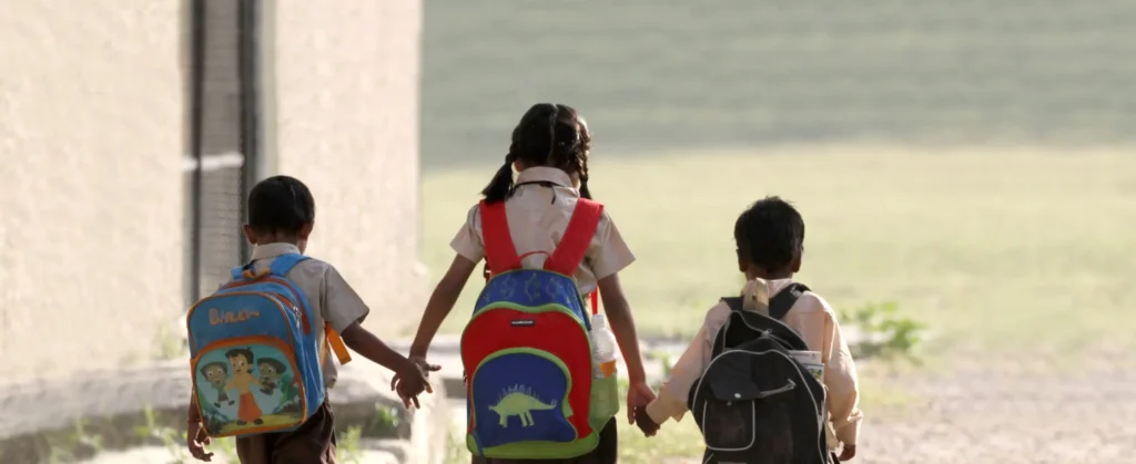 Young children on their way to school from Sri Ram Ashram in Northern India