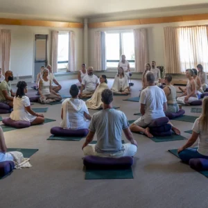Group of people meditating together during the Fall Silent Meditation Retreat at Mount Madonna in Northern California.
