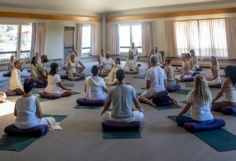 Group of people meditating together during the Fall Silent Meditation Retreat at Mount Madonna in Northern California