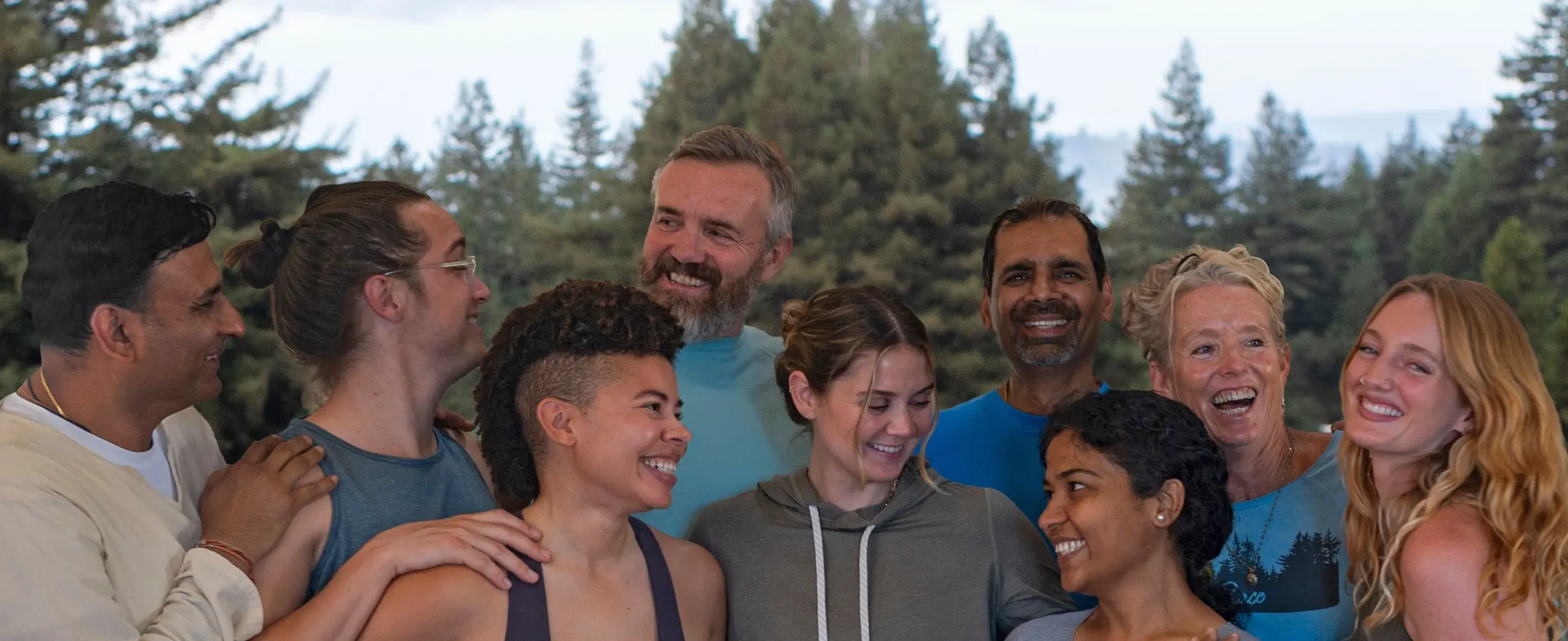 Group of people smiling at Mount Madonna, for the 2026 Charitable Giving article